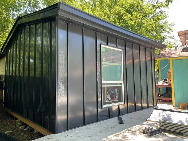 Black standing seam metal wall panels for Roof Inspection in Salisbury